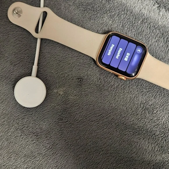 APPLE WATCH SE AND CHARGER (has a small scratch/crack) - Picture 3 of 4